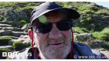 Double amputee Bash Wright climbs landmark hill unassisted