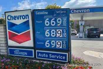 Exxon, Chevron Split Over How to Manage Rising Cash Piles