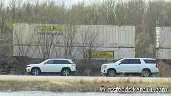 Train derails in Wisconsin, sends 2 cars into river