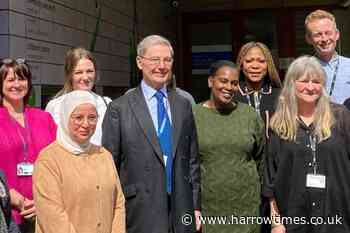 Government minister sees community resolving family conflict