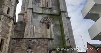 The 'leaning tower' in Bristol being dwarfed by cranes