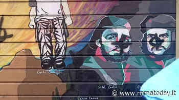 Blitz contro la sede di Rifondazione Comunista, croci celtiche sulla serranda