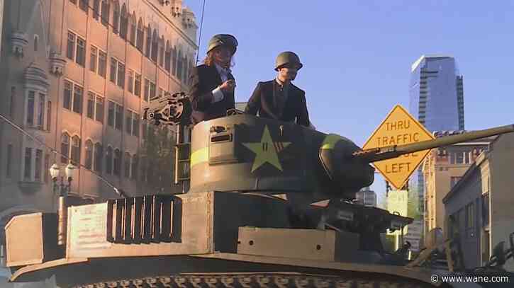 Teenagers ride tank to prom