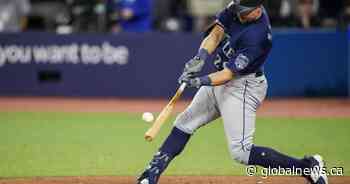 Mariners top Blue Jays 10-8 in extra innings