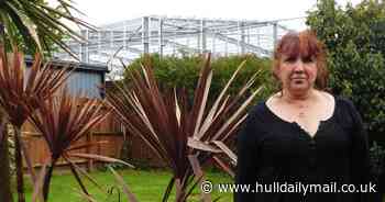 Woman fumes over Lidl store towering above her garden