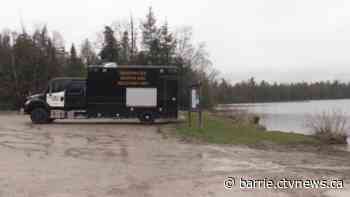 Officers and OPP divers continue search for missing man on Bass Lake