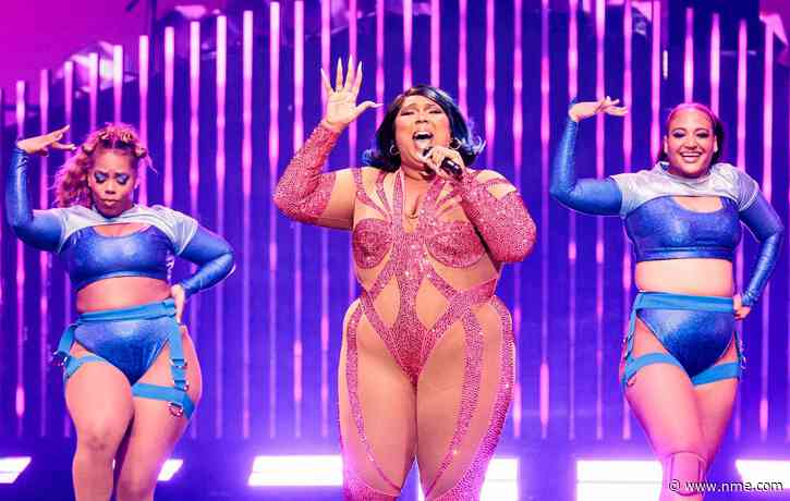 Watch Lizzo help fan create a butt tattoo mid-concert