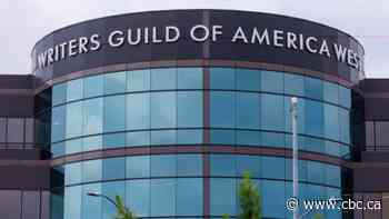 Hollywood writers, citing 'existential crisis,' are officially on strike