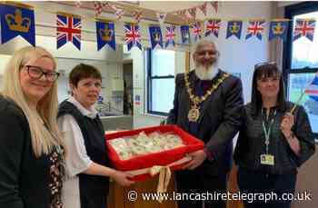 Darwen Children's Centre cook's Coronation biscuits to families