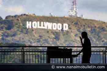 Hollywood writers begin strike, late-night shows go dark