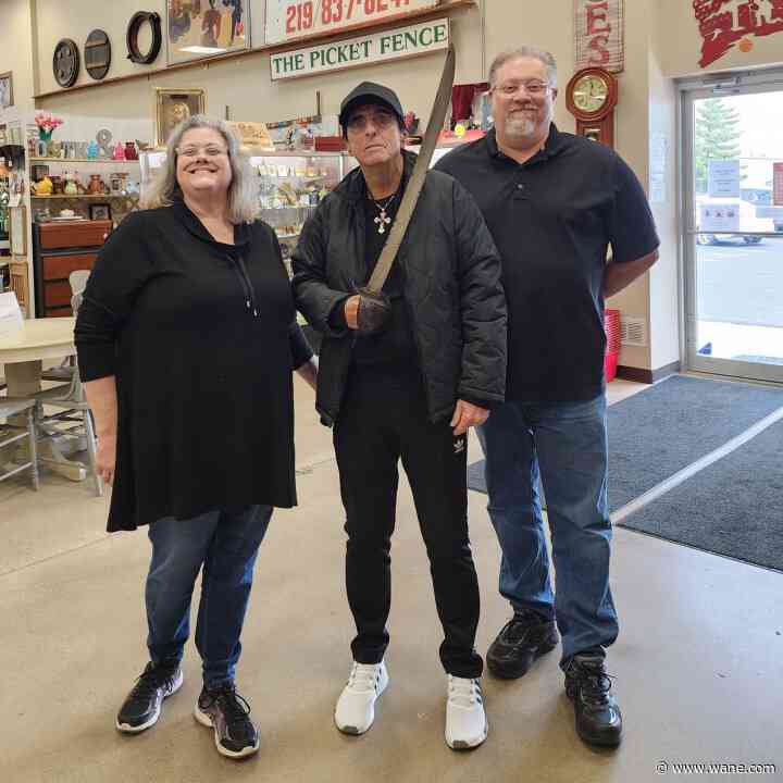 PHOTO: Alice Cooper buys sword at Fort Wayne antique store ahead of performance