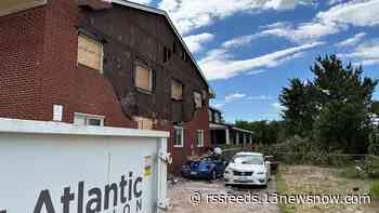 Straight-line winds tear apart Ocean View apartment building's brick wall