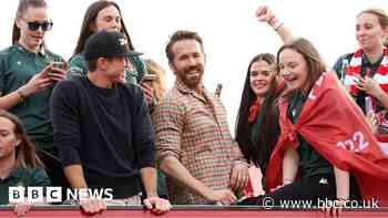 Wrexham: Ryan Reynolds and Rob McElhenney take photos on bus