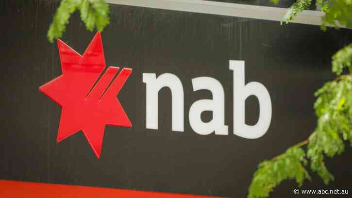 Markets as it happened: NAB shares dive on profit miss, ASX closes down as US Federal Reserve raises interest rates