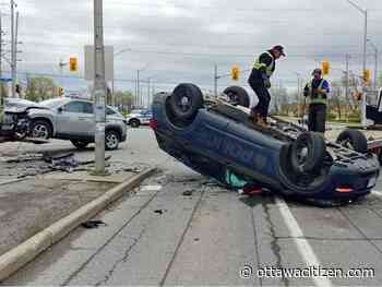 Police vehicle flips onto roof in crash at Blair and Ogilvie roads