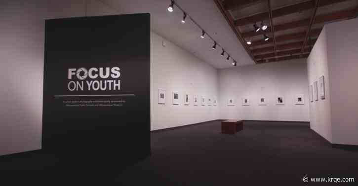 Exhibit showcasing student photography and artwork featured at the Albuquerque Museum