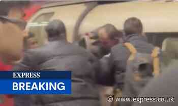 Tube commuters scramble to escape train with workmen smashing window after reports of fire