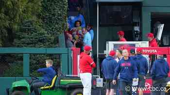 Spectator taken to trauma centre after falling over railing into bullpen at Phillies game
