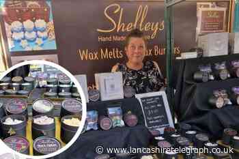 Woman opening wax melts shop Shelleys in Accrington today