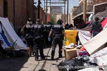 As migrants crowd El Paso streets, city to open vacant schools as shelters