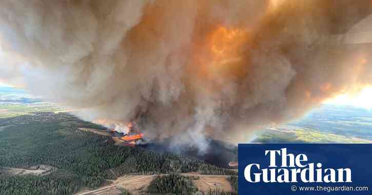 Thousands forced to evacuate as wildfires ravage western Canada