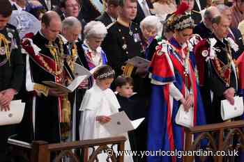 Prince Louis waves to crowds following King's coronation service