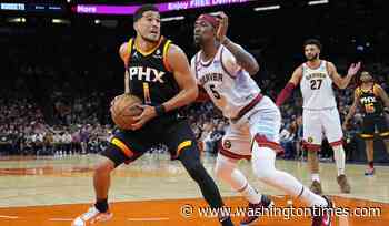 Booker scores 47, Durant adds 39, Suns beat Nuggets 121-114
