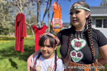 Indigenous domestic violence victim shares her story and her Red Dress Day display