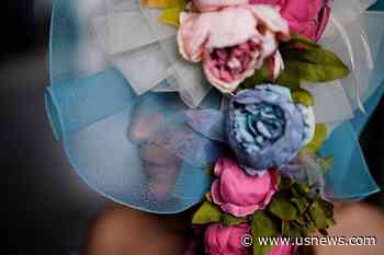 AP PHOTOS: Kentucky Derby Hat Styles: Bigger Is Often Better