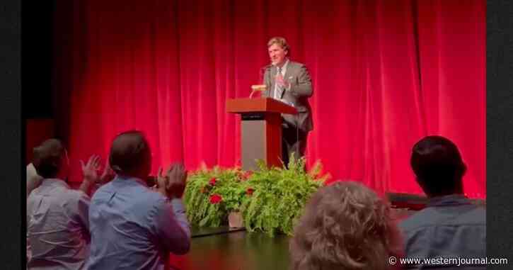 Crowd Gives a Standing Ovation as Tucker Carlson Makes First Public Appearance Since Fox News Firing