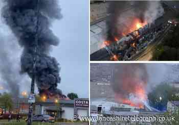 Crews remain in Blackburn following B&M Bargains fire