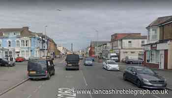Two men were throwing tiles from a roof in Blackpool