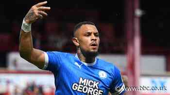 Barnsley 0-2 Peterborough United: Posh beat Barnsley to snatch play-off spot at Derby's expense