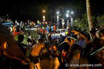 Rescuers Search for Victims of Capsized Tourist Boat in India; 22 Dead
