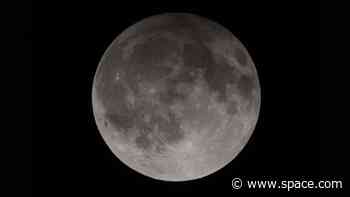 See 1st lunar eclipse of 2023 darken the full Flower Moon in eerie photos