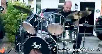 Police officer 'on the beat' as he takes to drums during coronation street party