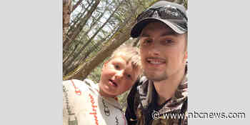 2nd grader who vanished while camping in Michigan is found safe after he sheltered under a log