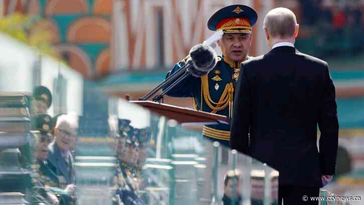 Putin tells Red Square parade 'real war' unleashed on Russia