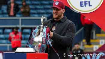 Former NFL star J.J. Watt does pub crawl with Burnley fans after the club earned a Premier League promotion