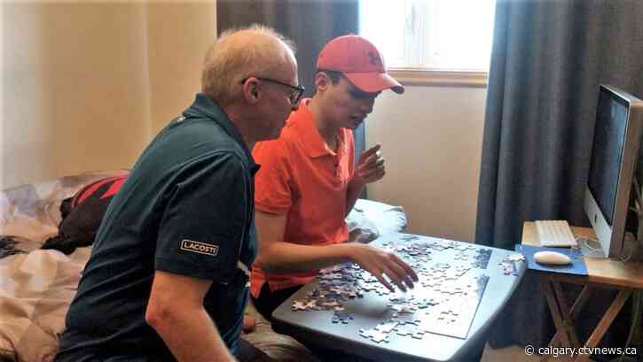 Calgary father struggling without provincial support for adult son with autism