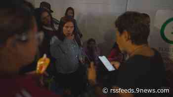 Inside Denver's overwhelmed intake facility, nonprofits guide migrants to shelter, resources