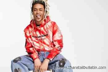 Asos posts first half loss