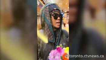 Woman strikes 2 people with bouquet of flowers on TTC platform, threatens to push man onto tracks: police