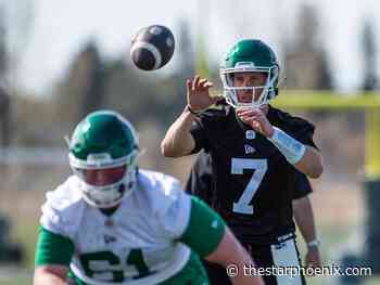 Trevor Harris gets a feel for life in a Riders helmet during Wednesday's rookie-camp opener