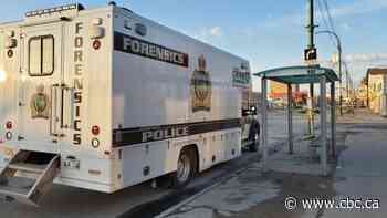 Forensics officers at crime scene in Winnipeg's North End