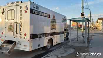 Forensics officers investigate crime scene in Winnipeg's North End
