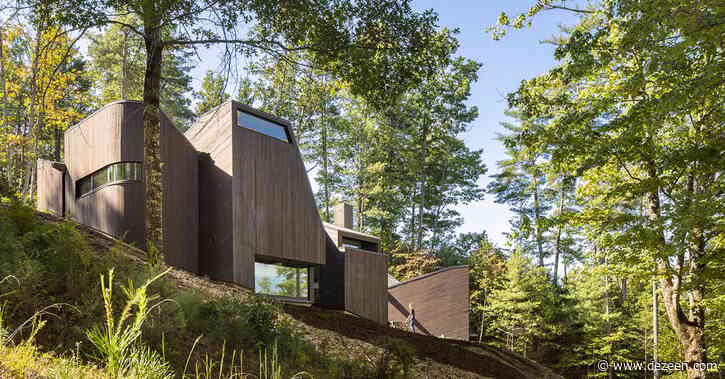 Fuller Overby stacks cypress-wrapped spaces for North Carolina lake house