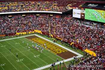 Commanders' Record Sale Agreed to by Snyder Family, Harris Group That Includes Magic Johnson