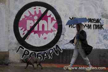 Tens of thousands march against Serbia’s populist leadership following mass shootings