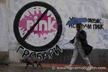 Tens of thousands march against Serbia’s populist leadership following mass shootings